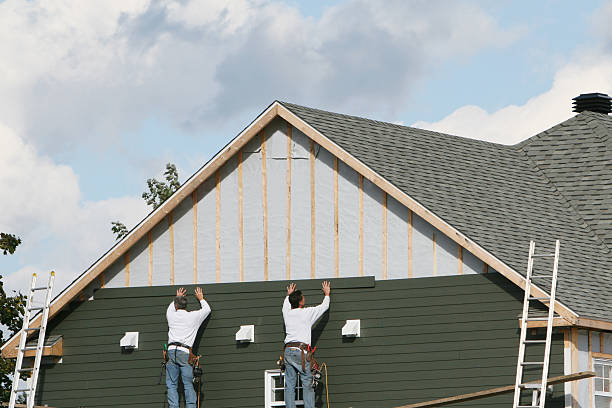 Professional Siding Contractor technician working in Russellville, OH